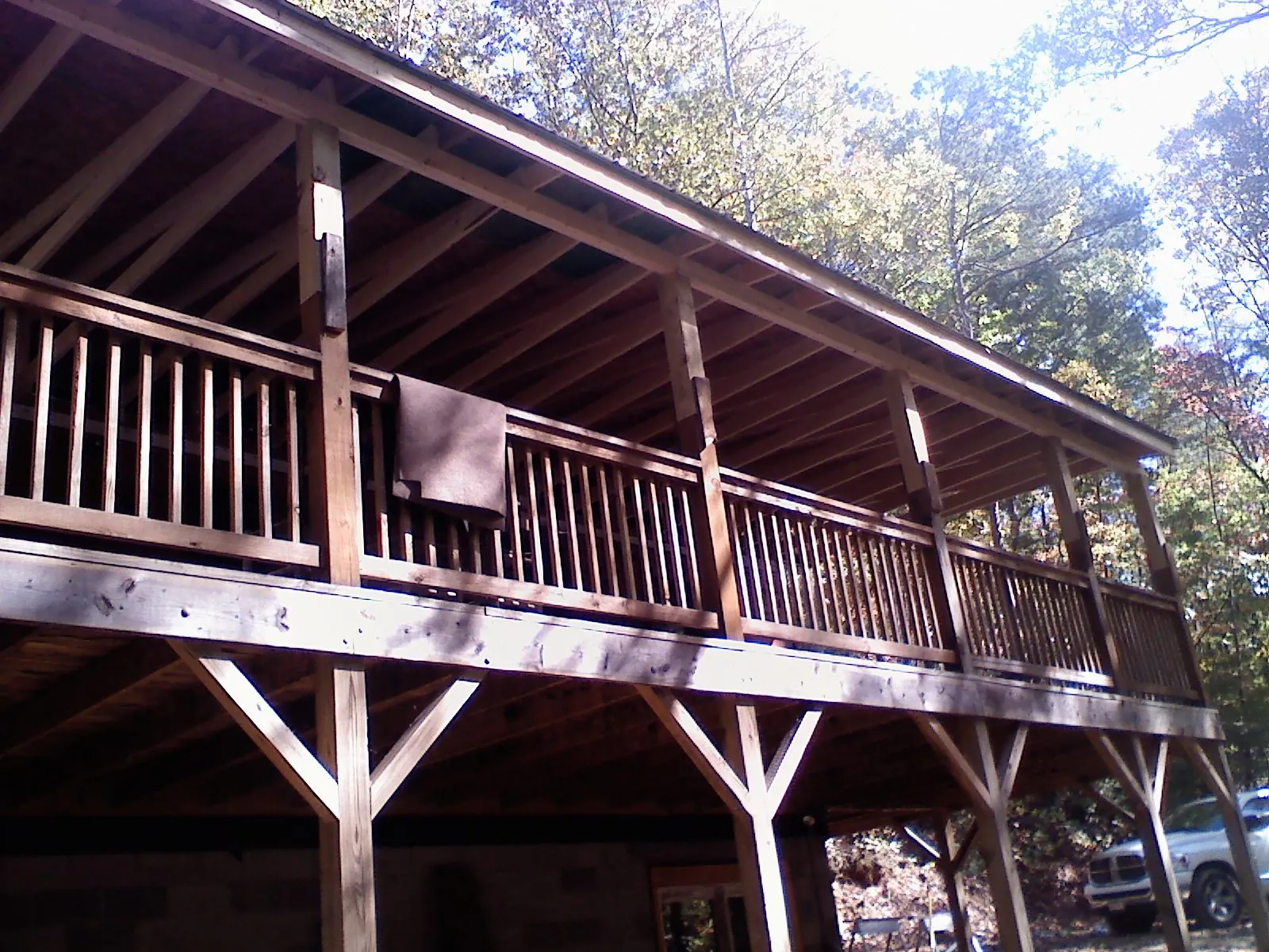 Timber framing under a new elevated porch and deck — Roof Leak Repair in Atoka by Roofing Brothers
